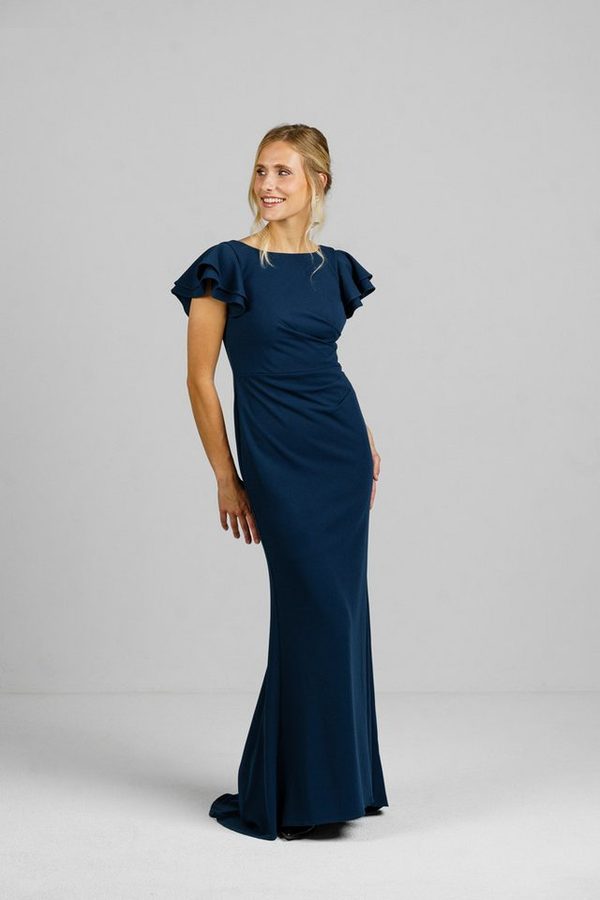 ANNIS WIESBADEN EST. 2021 Abendkleid Abendkleid „Celeste“ dunkelblau Meerjungfrau-Linie rückenfrei Volantärmel, mit Schleppe von ANNIS WIESBADEN EST. 2021